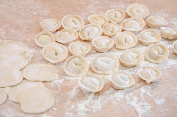 homemade dumplings on the kitchen table. Grandma's delicious dumplings.