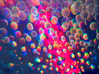 Colored Disco Ball abstract background. Natural lighting effects..Artistic style. Defocused urban abstract texture. Background for your design