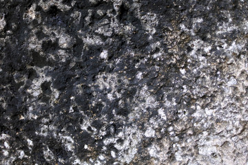 rough surface of the stone. rock formation. shade of gray