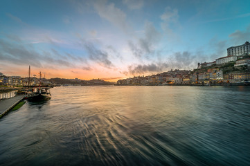 Naklejka premium View along the Rio Douro and Porto at dusk.