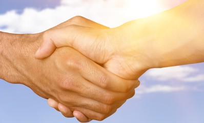Closeup of Two Men Shaking Hands