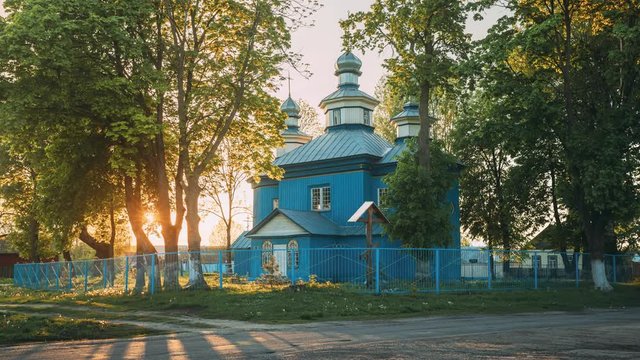 Staraya Belitsa, (Uritskiy Sel'sovet), Gomel Region, Belarus. Old Wooden Orthodox Church Of St Nicholas The Wonderworker During Summer Sunset. Orthodox Church Of St. Nikolaya Chudotvortsa