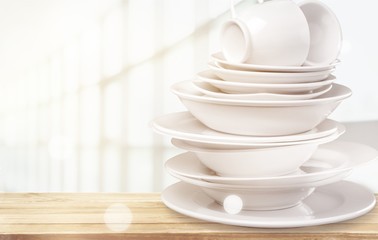 Pile of White Dishware isolated on white