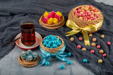 Obraz na płótnie Canvas Almond candies.Colorful candies background top view, almond sweets. Sugar Feast, (Feast of Ramadan) Ramadan concepts.