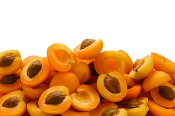 Ripe juicy orange apricots slices isolated on white background. Space for text or design.