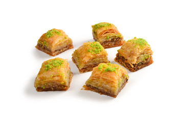 Pistachio baklava on a white background. Dessert.