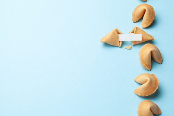 Chinese fortune cookies. Cookies with empty blank inside for prediction words. Blue background Copy...