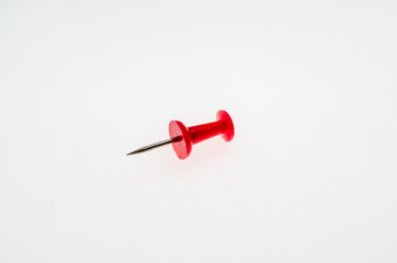 Red thumbtack close-up on white background without shadows - 270270227