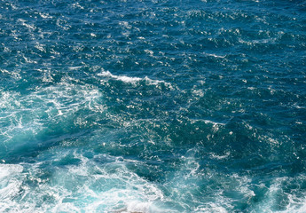Ocean water texture background for design.Blue sea waves texture pattern.Selective focus.