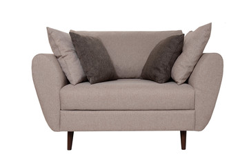 Modern small grey fabric sofa with pillows isolated on white background. Strict style furniture
