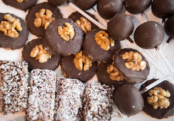 For a good life have a good bite. Mixed biscuits. Dark chocolate covered buiscuits. Baked biscuits food in assorted flavors. Delicious biscuits or cookies