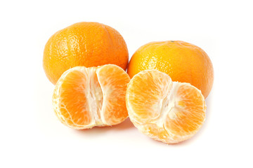Fresh mandarin orange and peeled fruit isolated on white background