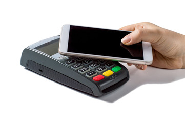 Point of sale terminal contactless payments with smartphone. Close up photo of customer paying contactless with phone isolated on white background. Concept for banking, finance and payment systems.
