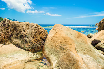 The giant granite boulders on the beach