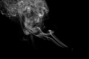 smoke or steam on a black background
