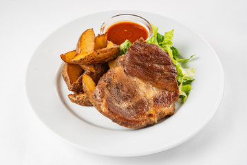 steak with baked potatoes and salad