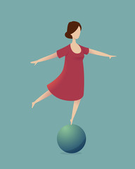 Girl keeping balance standing on the ball on one leg
