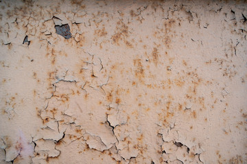 Used rusty red metal surface with fall off pieces