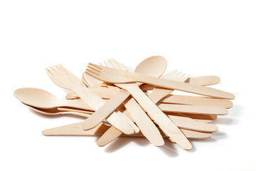 Eco-friendly materials. Wooden, disposable tableware on a white background.