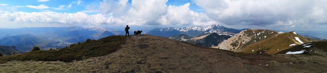 Obraz premium Panoramic mountains landscape in early spring - snow in the mountains 