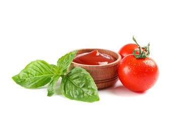 Fresh cherry tomatoes with basil and souce isolated on white background. Ripe vegetables