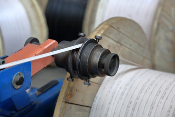 Industrial equipment at the plant for the production of high-tech wires and specialized cables