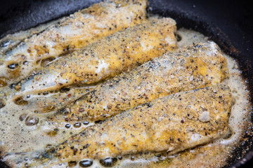 barbecued prawns in a griddle pan cooked with lemon and garlic