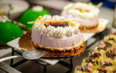 white cakes on the buffet