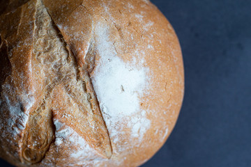 fresh loaf of homemade bread baked with wheat flour