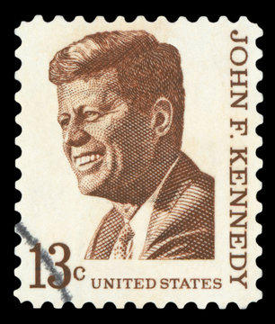 UNITED STATES OF AMERICA - CIRCA 1967: A used postage stamp printed in United States shows a portrait of the President John Fitzgerald Kennedy in brown, circa 1967.