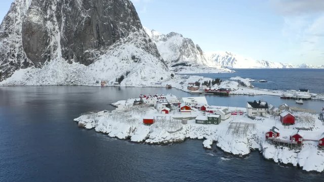 Beautiful drone video of scenic Lofoten Islands archipelago winter scenery with traditional fisherman Rorbuer cabins in the historic villages Reine, Hamnoy, Sakrisoy - Norway, Scandinavia
