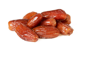 Sweet dates fruit or pile of dried dates isolated on white background