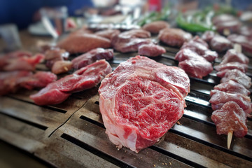 Mixture of Raw Meat on Barbecue