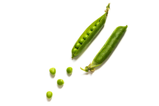 Raw green pea pods isolated on white background.
