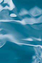 .Turquoise liquid shiny background.