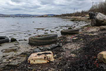 coast of the Kola Bay, pollution of the coastline with waste