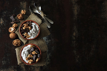 Chia yogurt, black chocolate and walnuts. Keto breakfast. Keto diet.