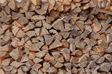 Piled on top of each wood. Background for anything.