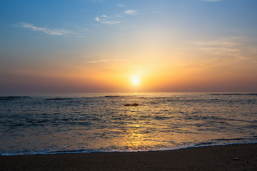 Beautiful sunset on the sea beach.
