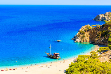 Sailing boat in beautiful bay at Apella beach, Karpathos island, Greece