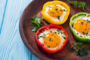 Yellow , red and green pepper with fried eggs