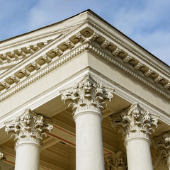 Courthouse. Supreme court. Ornate columns and a pediment in a style of classical architecture. Legal and order. Classic style. Justice. Law. Legal system. Court hearing. Lawsuit. Court proceeding