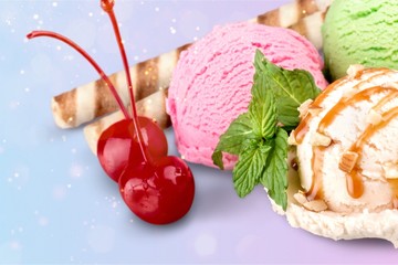 Tasty ,sweet Ice Cream  in cup on background