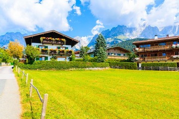Traditional alpine houses in village of Going am Wilden Kaiser on beautiful sunny summer day, Tirol, Austria