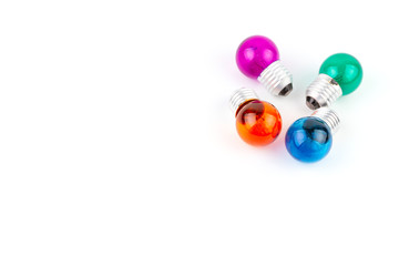 Group of Multiple color Incandescent round light bulb isolated on white background and have copy...