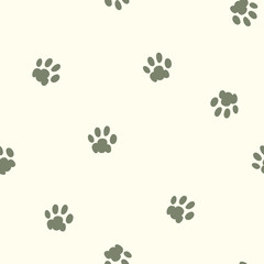 Naklejka na ściany i meble Seamless repeat pattern with taupe dog or cat paw prints on a cream background