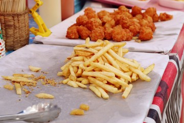 French fries and fried chicken at market