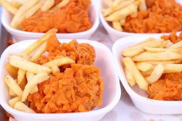 French fries and fried chicken at market