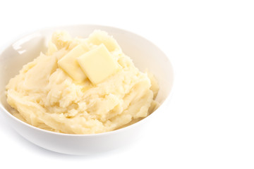 Potatoes with Butter Isolated on a Wooden Table