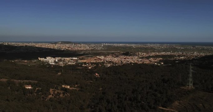 Aerial view  of fields of cherry blossom  in Barcelona. Sant Climent de Llobregat. Spain. 4k Drone Video